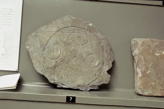 Copy of colour slide showing detail of stones in Whithorn Priory museum-
Insc: " Stones from St. Ninian's Cave, Physgill,  Whithorn Museum C7 "
NMRS Survey of Private Collection 
Digital Image Only