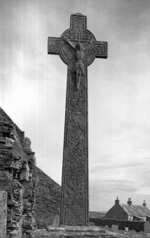 Oronsay Priory, Great Cross.
Detail of cross of Colinus MacDuffie from West showing interlace and Christ crucified.