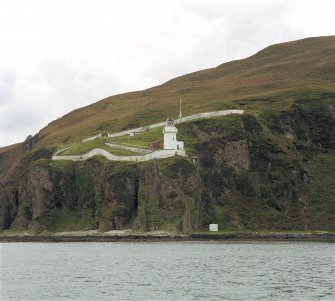Islay, McArthur's Head Lighthouse
General view from E (in the sound of Islay), showing the impressive cliff-top location of the lighthouse and compound, to which access and supply was only possible by sea using a small jetty at the base of the cliffs