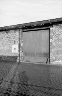 View from S showing doorway on SSW front of S goods shed