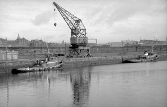 View from SW showing crane on north quay