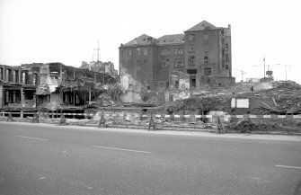 View from SSE showing remains of 400 Cathedral Street with 38-44 Cunningham Street in background