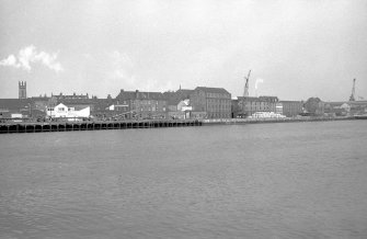 General view looking E showing Waterloo Quay with numbers 30-87 Waterloo Quay in background