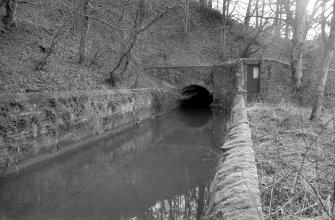 View from NNE showing N entrance to lade tunnel with part of lade in foreground