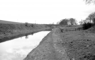 View looking WSW showing canal at Woodcockdale with bridge in background