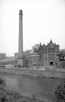 General view from SE showing chimney and ESE front