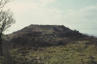 Copy of colour slide showing distant view of Dun MacUisneachan ( Dun MacSniachan) Benderloch, Strathclyde  - view of main enclosure from NE summit of hill
NMRS Survey of Private Collection 
Digital Image Only