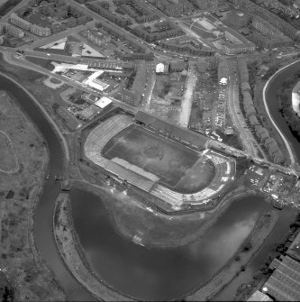 Glasgow, Firhill Park.
Oblique aerial view of football ground. Digital image of B/21487.