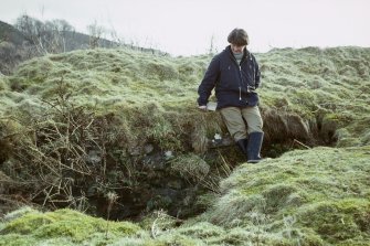 Copy of colour slide showing view of topmost enclosure Dun MacUisneachan ( Dun MacSniachan) Benderloch, Strathclyde  -insc  " inner face of walling on S. side. Late, intrusive?"
NMRS Survey of Private Collection 
Digital Image Only