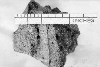 Copy of black and white slide showing detail of vitrification from Meall an Iarnuin, Inverpolly. 
Vitrification showing development of glass lined vesicles and banding in Gneiss
NMRS Survey of Private Collection 
Digital Image Only