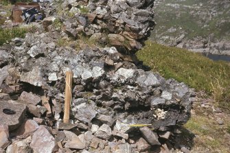 Copy of colour slide showing detail of vitrification; Meall an Iarnuinn, Inverpolly, Highland;
Vitrified mass: detail of horizontal timber casts
NMRS Survey of Private Collection 
Digital Image Only