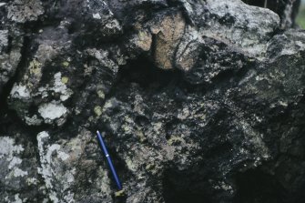 Copy of colour slide showing possible vitrification near Dunnideer.
Insc: " Detail of vitrified mass on south side, outer side - Detail large wood cast"
NMRS Survey of Private Collection
Digital Image only