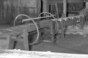 Interior.
View of extruder and wire-cutting machine.
Digital image of AB 5983.