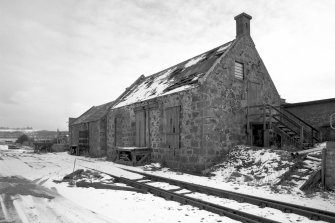 General view from NW of buildings associated with the dispatch of whisky from the distillery by rail.
Digital image of C 62082.