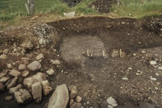 Copy of colour slide showing detail of excavations at Cullykhan, Castle Point, Troup, Banffshire - prehistoric hut site?
NMRS Survey of Private Collection
Digital Image only