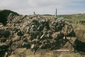 Copy of colour slide showing detail of excavations at Cullykhan, Castle Point, Troup, Banffshire - vitrification?
NMRS Survey of Private Collection
Digital Image only