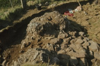 Copy of colour slide showing detail of excavations at Cullykhan, Castle Point, Troup, Banffshire - prehistoric hut?
NMRS Survey of Private Collection
Digital Image only