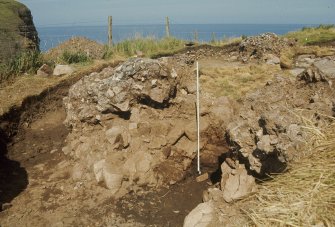 Copy of colour slide showing detail of excavations at Cullykhan, Castle Point, Troup, Banffshire - prehistoric hut site?
NMRS Survey of Private Collection
Digital Image only
