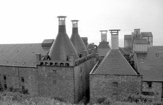 View from NW showing kiln vents of Ravenscraig Maltings