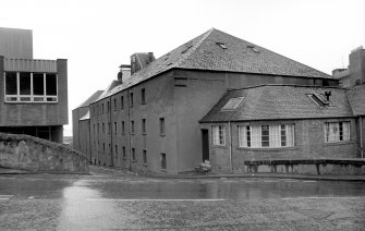 View from NW showing NNE front and part of WNW front of central blocks of Harbour Maltings