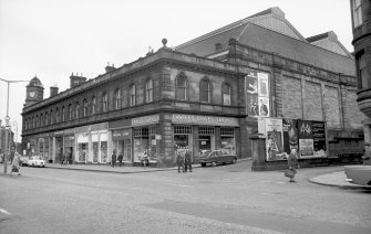 View from SW showing WNW and SSW fronts of numbers 3-23 Leith Walk with part of main block of station in background