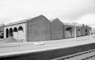 View from SE showing S and E fronts.