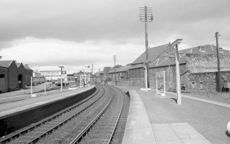 General view looking N from station with part of mill on right and pool mill in background