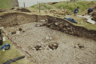 Copy of colour slide showing detail of excavations at Cullykhan, Castle Point, Troup, Banffshire - prehistoric hut site,stake holes?
NMRS Survey of Private Collection
Digital Image only