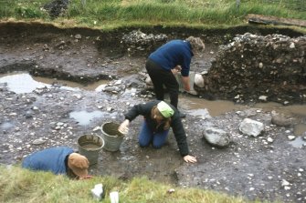 Copy of colour slide showing detail of excavations  Cullykhan, Castle Point, Troup, Banffshire
- uncovering foundation walling?
NMRS Survey of Private Collection
Digital Image only