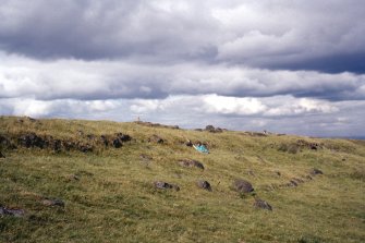 Copy of colour slide showing general view of Duncarnock Hill Fort, Renfrewshire; main rampart and "walk" from annexe wall  looking NE.
NMRS Survey of Private Collection
Digital Image only