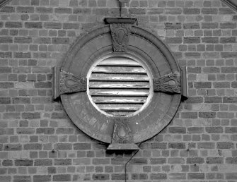 Detail of circular window on E side of Spirit Store.
Digital image of B 74133.