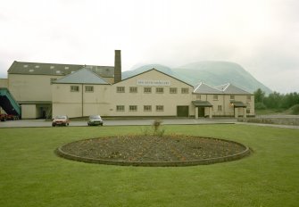 General view from NW of main block, including the two Tun Rooms, Mash House, Malt House and boiler House chimney.
Digital image of B 74727 CN.