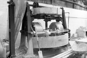 Interior view of wet pan mill, pan 180cm diameter by 25cm deep rollers, 33cm wide by 84 diameter, Longpark Pottery, Kilmarnock.