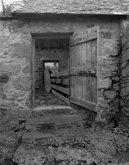 View looking through open doors of hay barn from SW
Digital image of D 3079.