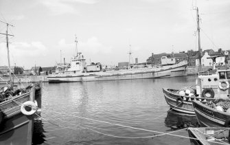 View looking NE showing dredger at N quay