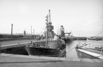View from NE showing trawler in dock