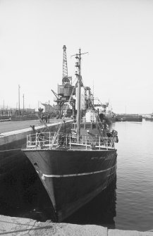 View from ENE showing trawler in dock