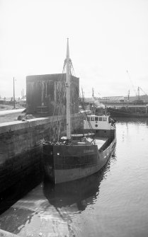 View from NNW showing 'puffer' called Glenshira in dock