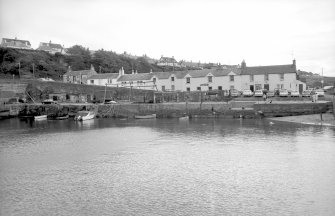 View from N showing harbour with part of numbers 1-19 Harbour View in background