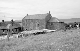View from SE showing part of S and E fronts of mill with part of cottages on left