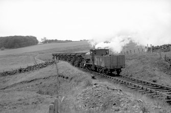 View showing NCB locomotive number 21 and wagons at Minnivey