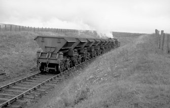 View showing NCB locomotive number 21 and wagons at Minnivey