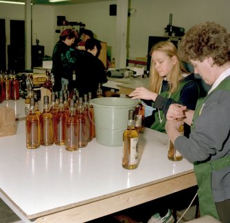 Bottling Hall:  labling in progress
Digital image of C 64635 CN