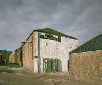 View from E along SE side of distillery (Well Close), with former maltings (now Malt Store) in foreground, and floor-Maltings block in background
Digital image of C 64637 CN