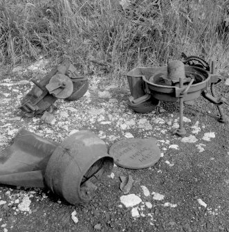 View of base of stoker (right) and damaged fuel bucket
Digital image of B/9380