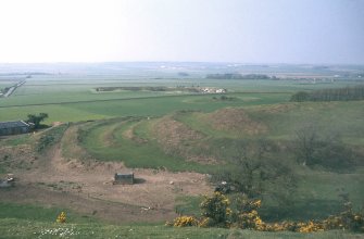 Copy of colour slide showing view of  The Chesters fort, Drem East Lothian  - defences at west end
NMRS Survey of Private Collection
Digital Image only