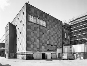 View from east of south east corner of Tun Room block, withpart of Still House visible (right).
Digital image of C 5637