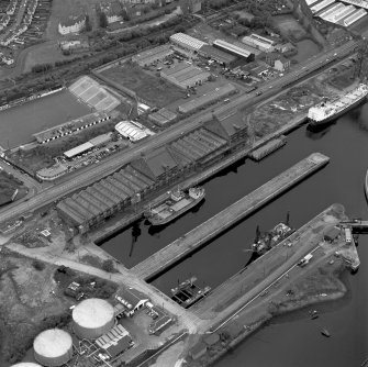 Greenock, James Watt Dock, oblique aerial view, taken from the ENE. Cappielow is visible in the top left-hand corner of the photograph.