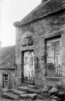 Ceres, High Street.
View of front of building, with jougs to right of door.
