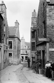 Orkney, Stromness, Dundas Street. 
View from S showing part of SSW and ESE fronts of number 5 on left with numbers 2-4 on right
